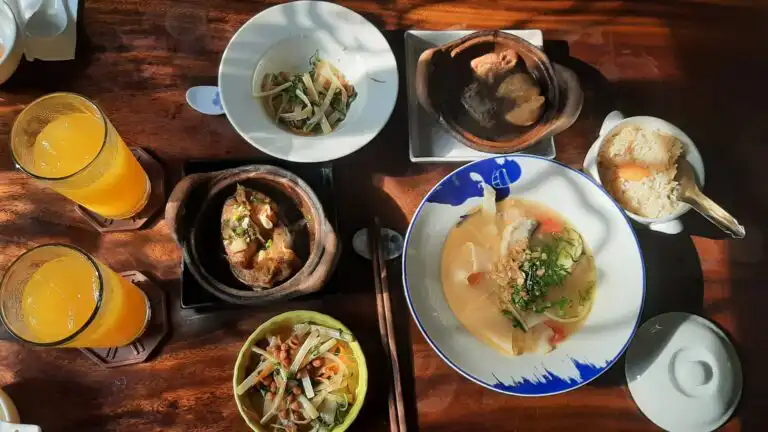 Best Vietnamese dishes: shared meal with vegetables and soup and broken rice